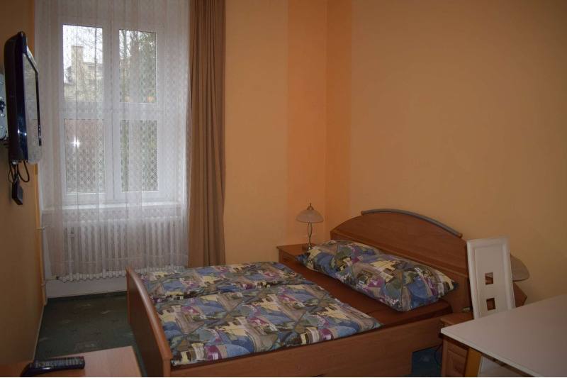 Apartmán č. 1 — lůžková část s manželskou postelí